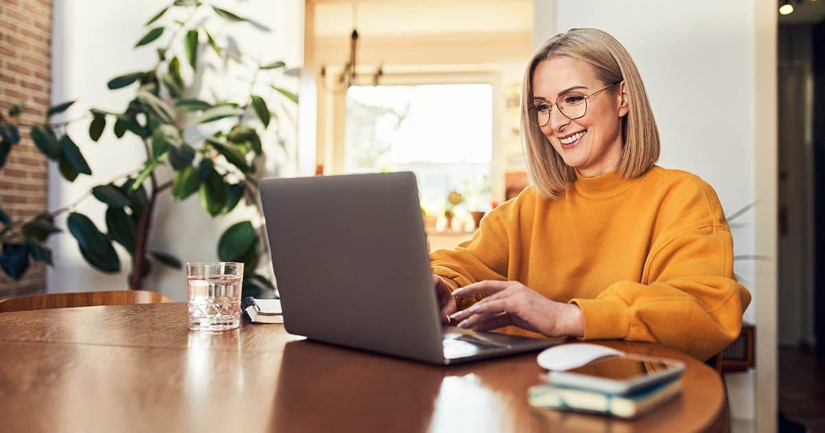 woman learns cybersecurity tips to help safeguard her wealth