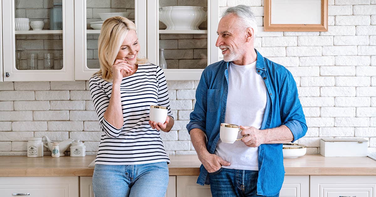 mature woman and man in relationship plan retirement together