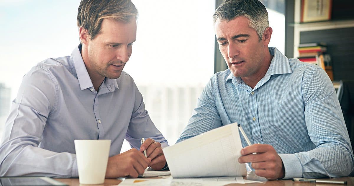 Tax advisor going through tax credit application with client