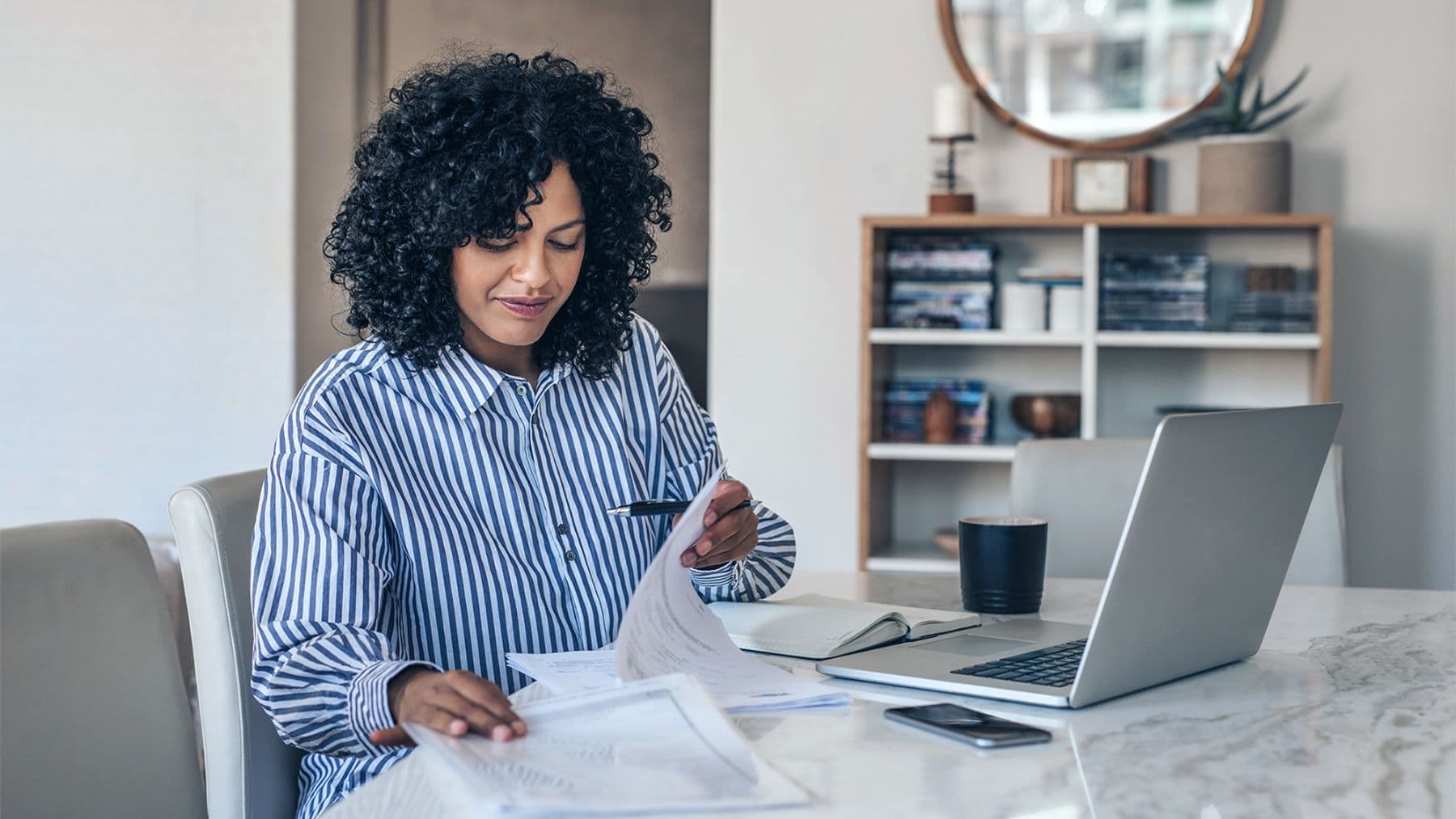 Woman reviewing retirement plans