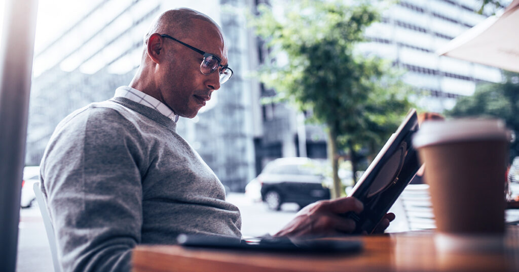 Businessman sitting at a café.
