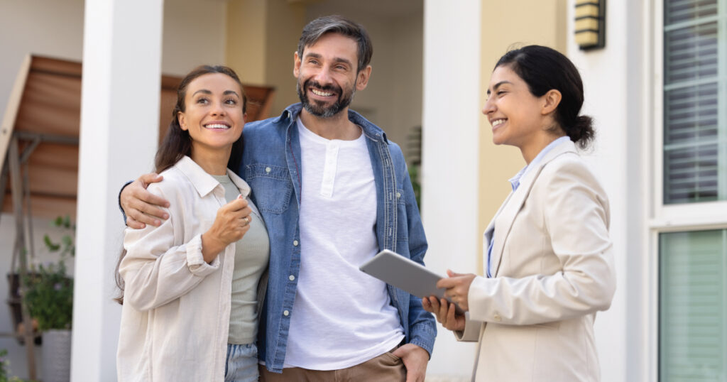 Younger couple with realtor