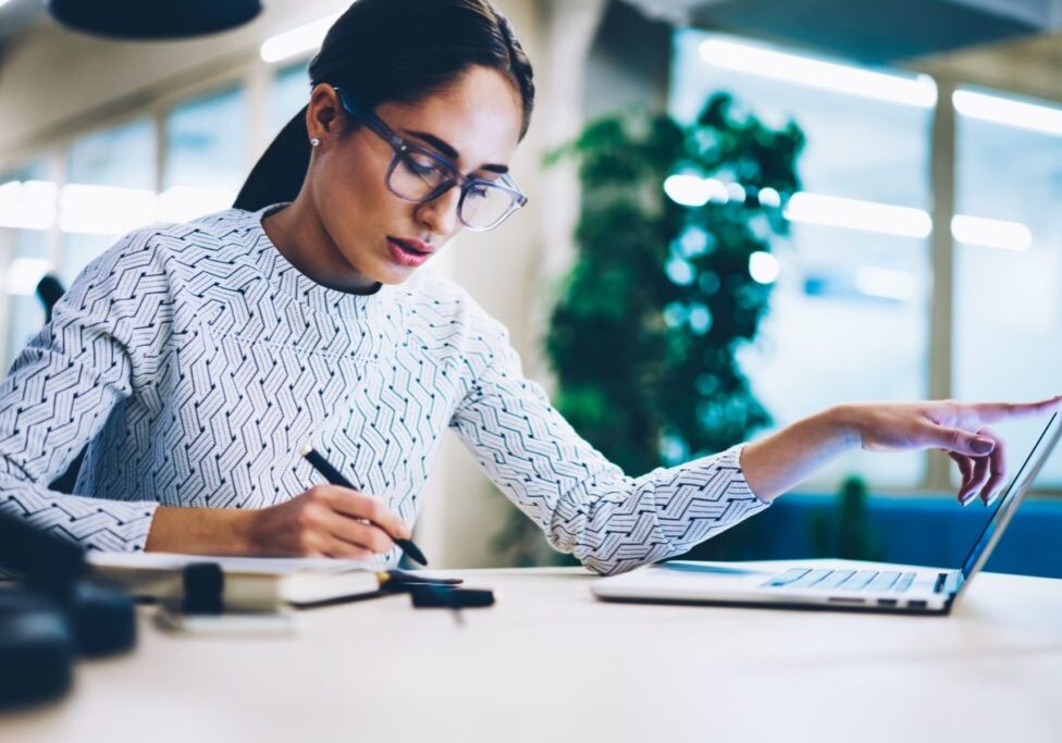 Woman looking through statements