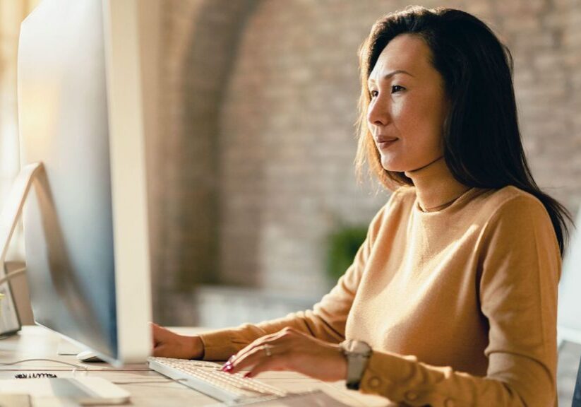 Businesswoman working on a computer.