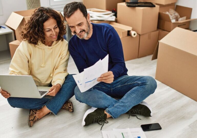 Couple reviewing financial documents
