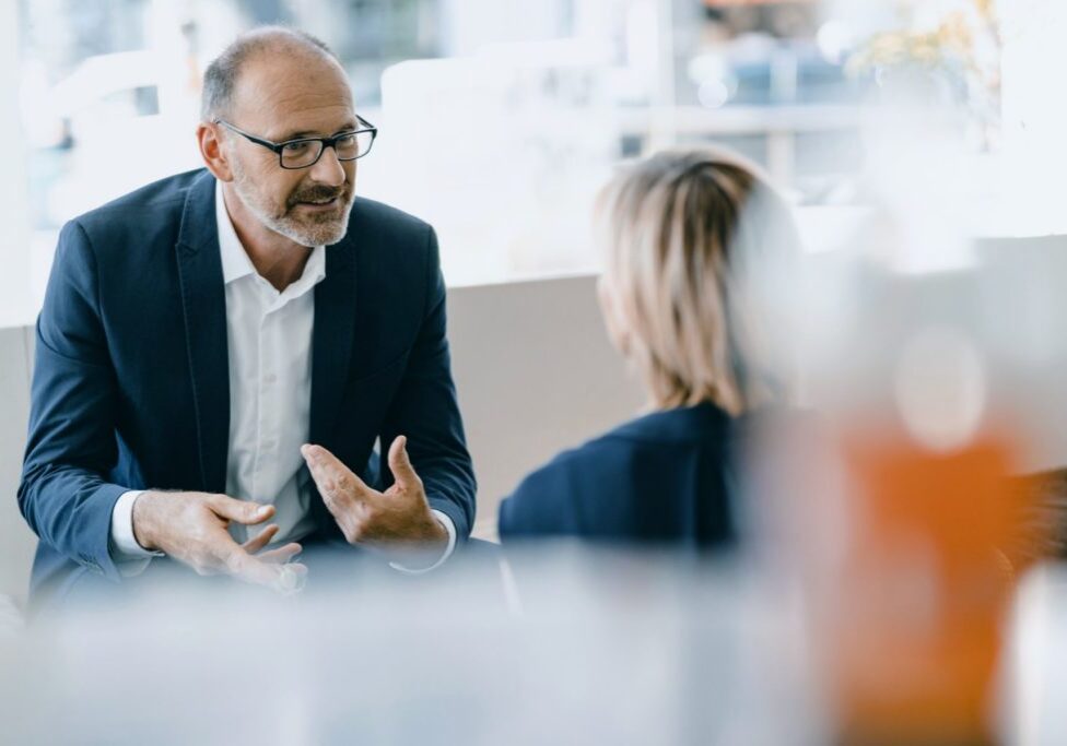 Man and woman in meeting