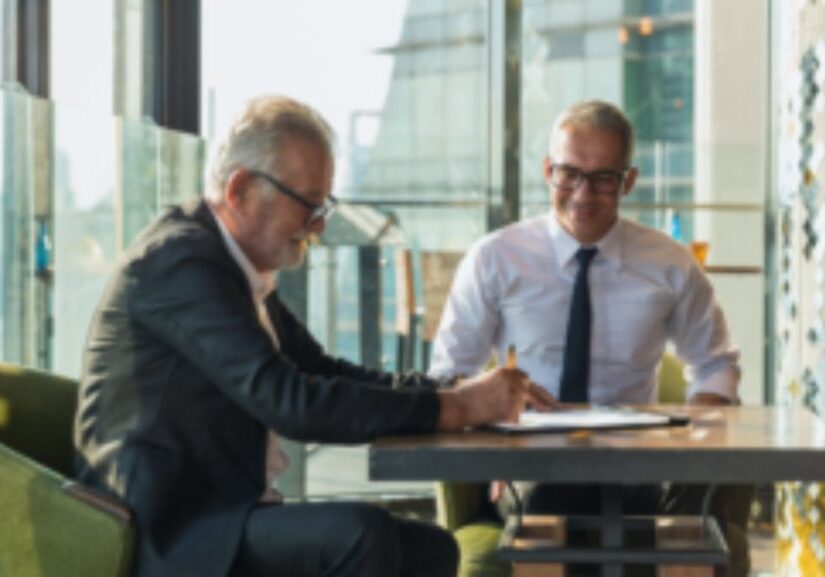U.S. expat sitting down for a meeting