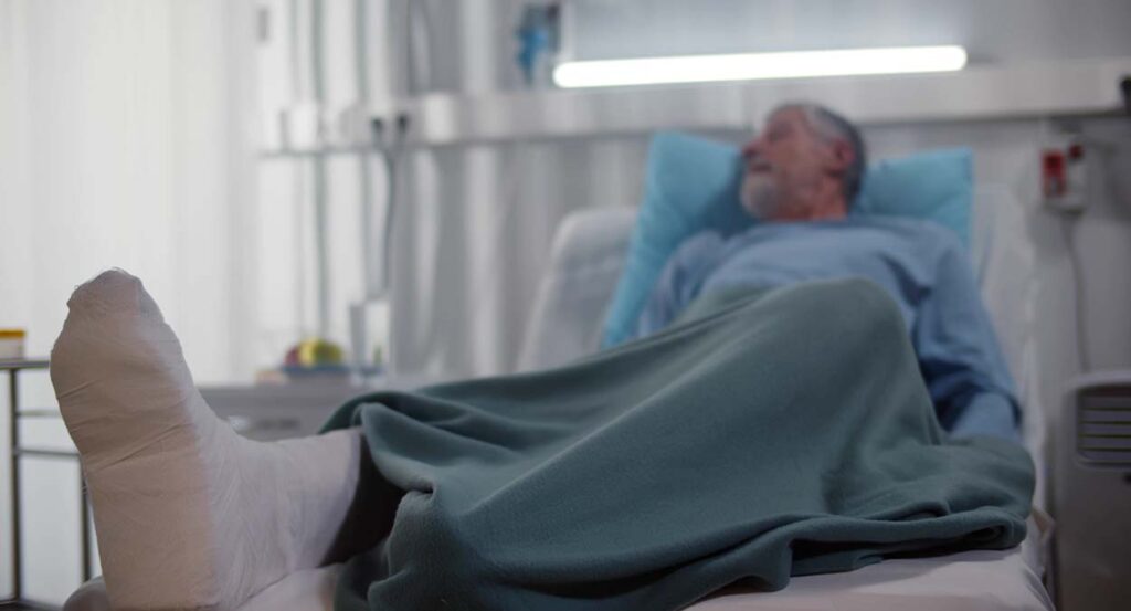 Senior businessman in hospital after a sudden accident