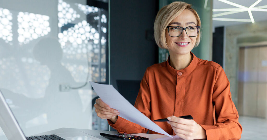 business owner reviewing her tax documents