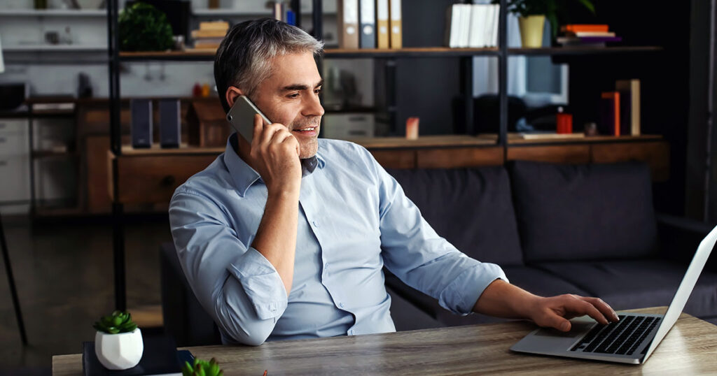 business owner on phone in office