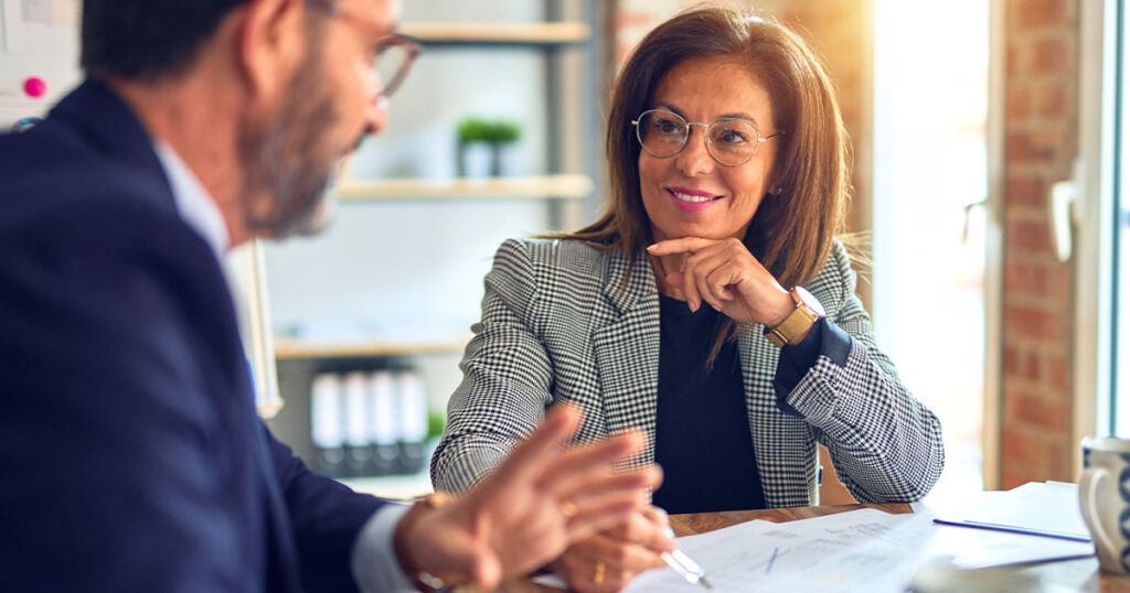 Business owner evaluating her outsourced provider in a meeting