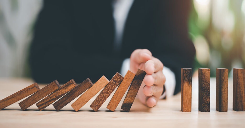 Business leader illustrating how a risk management strategy can protect a business