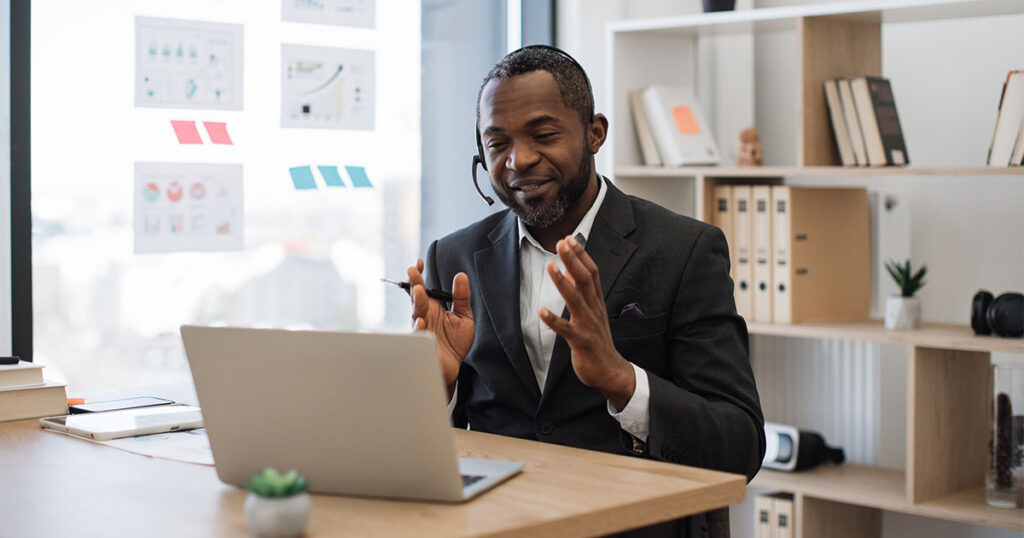 Virtual Chief Information Officer (vCIO) talking with clients on a video call