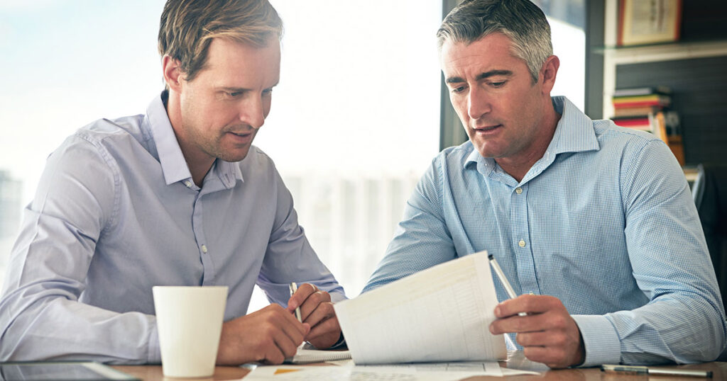 Tax advisor going through tax credit application with client