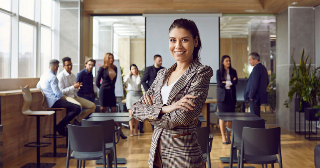 Business leader instructing a leadership training for her peers in the office