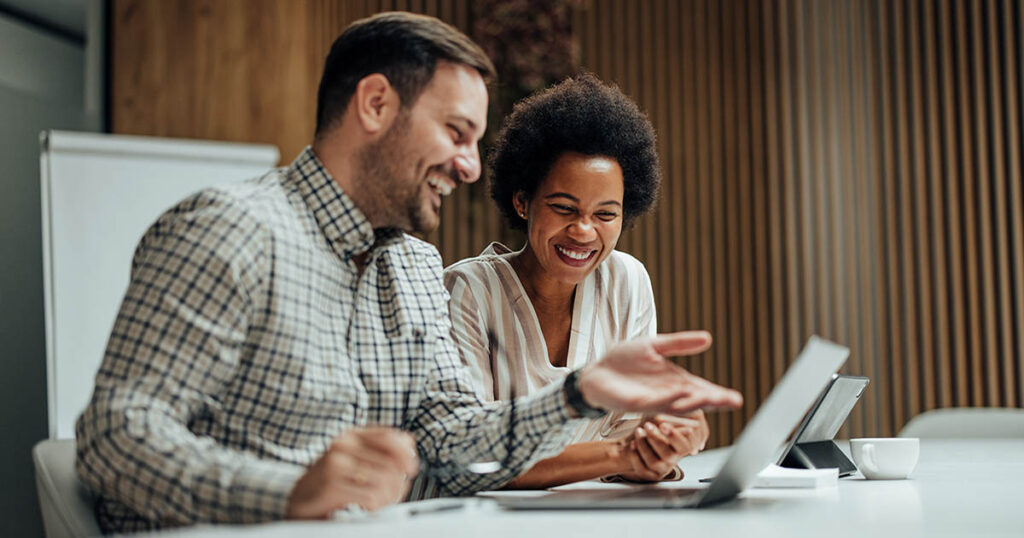 Business owners work together to choose accounting software for their business