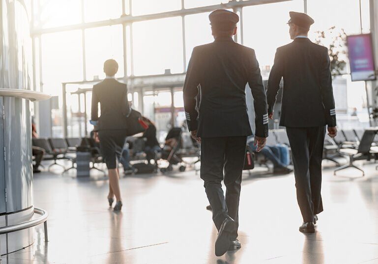 Pilots walking in airport