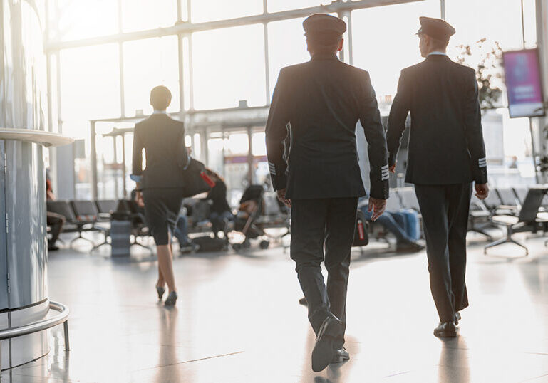 Pilots walking in airport