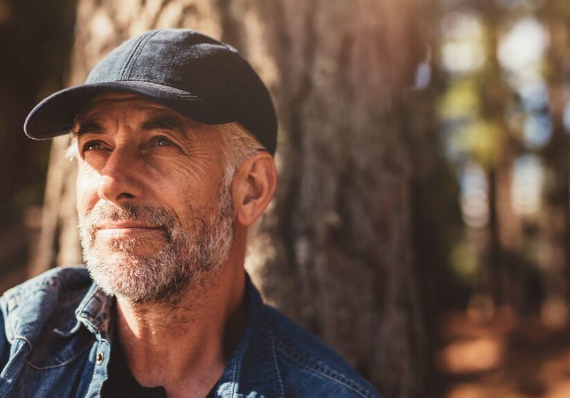 Man looking out into peaceful future