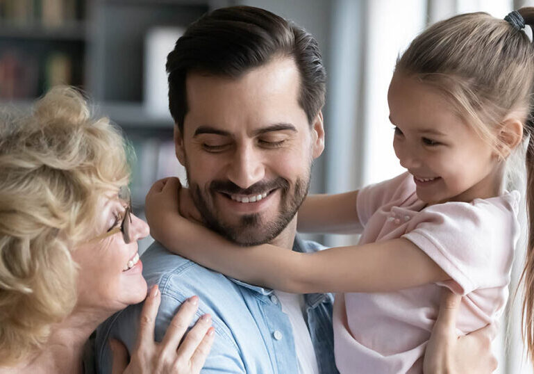 Man cares for his parent and his child as part of sandwich generation