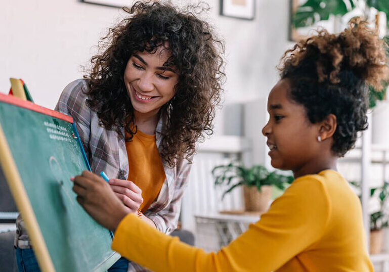 Mother teaches daughter financial literacy