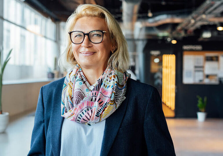 Portrait of smiling 50's stylish, confident mature businesswoman, middle aged company ceo director, experienced senior female professional, business coach team leader in modern office. Female leader.