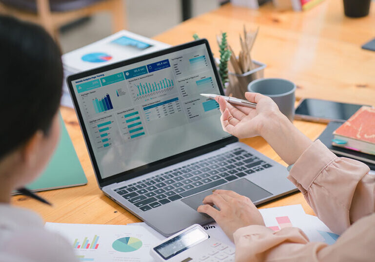 Two businesspeople decide what level of accounting support their business needs