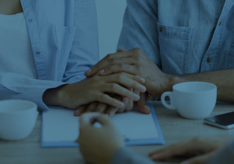 Couple meeting with advisor