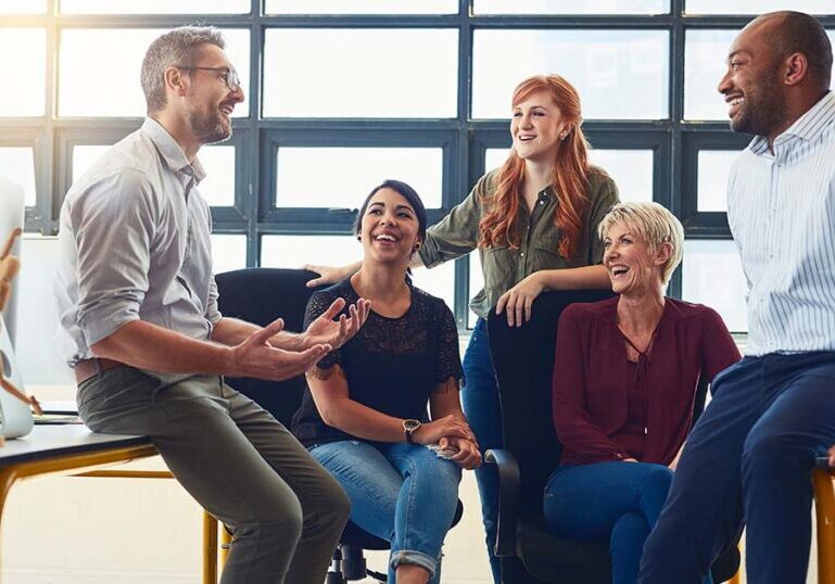 business team discussing workplace culture at informal meeting