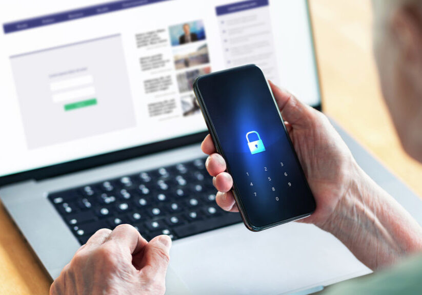 Senior and phone with lock password to protect data in online bank website. Old woman with smartphone. Cyber security and personal information safety and privacy from hacker fraud. Elder person.