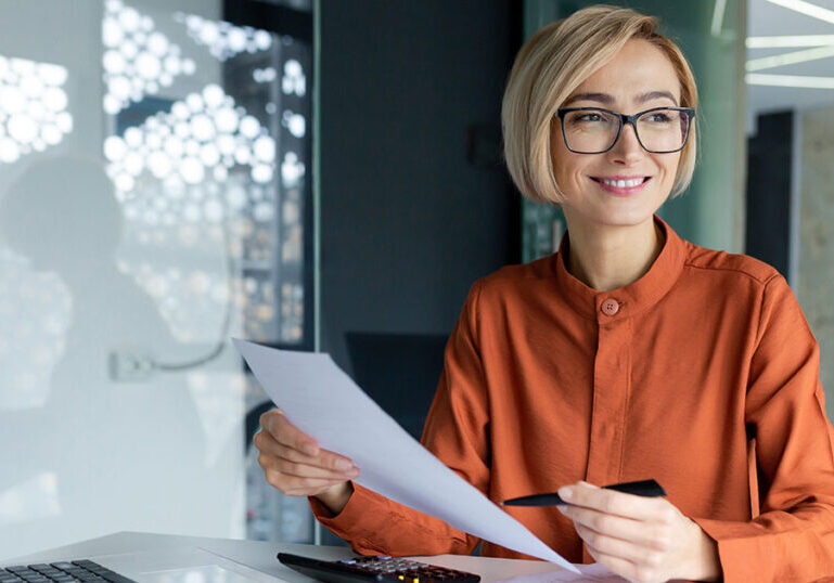 business owner reviewing her tax documents
