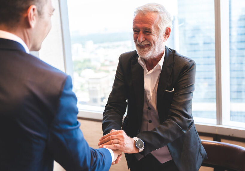 Group of sucessful business person and coworker hand shaking with smile and happy for new start up project at the office conference meeting room