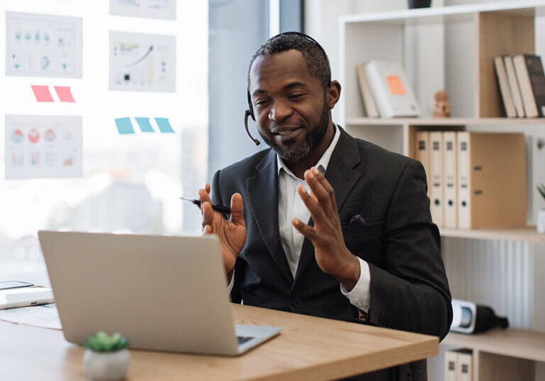 Virtual Chief Information Officer (vCIO) talking with clients on a video call